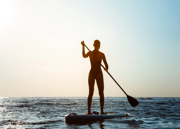 Paddleboarder with lake to herself